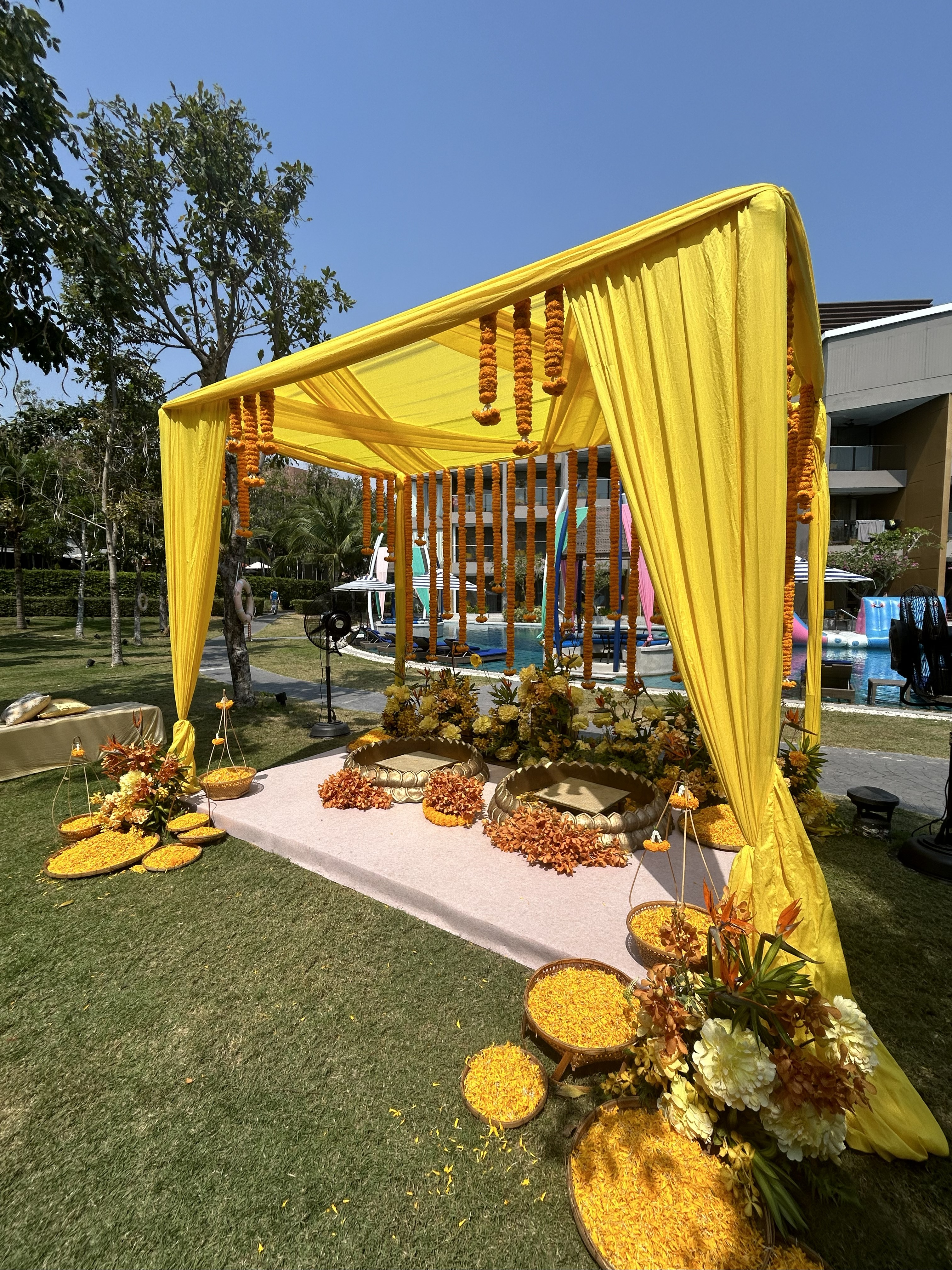 Haldi ceremony decoration with yellow flowers